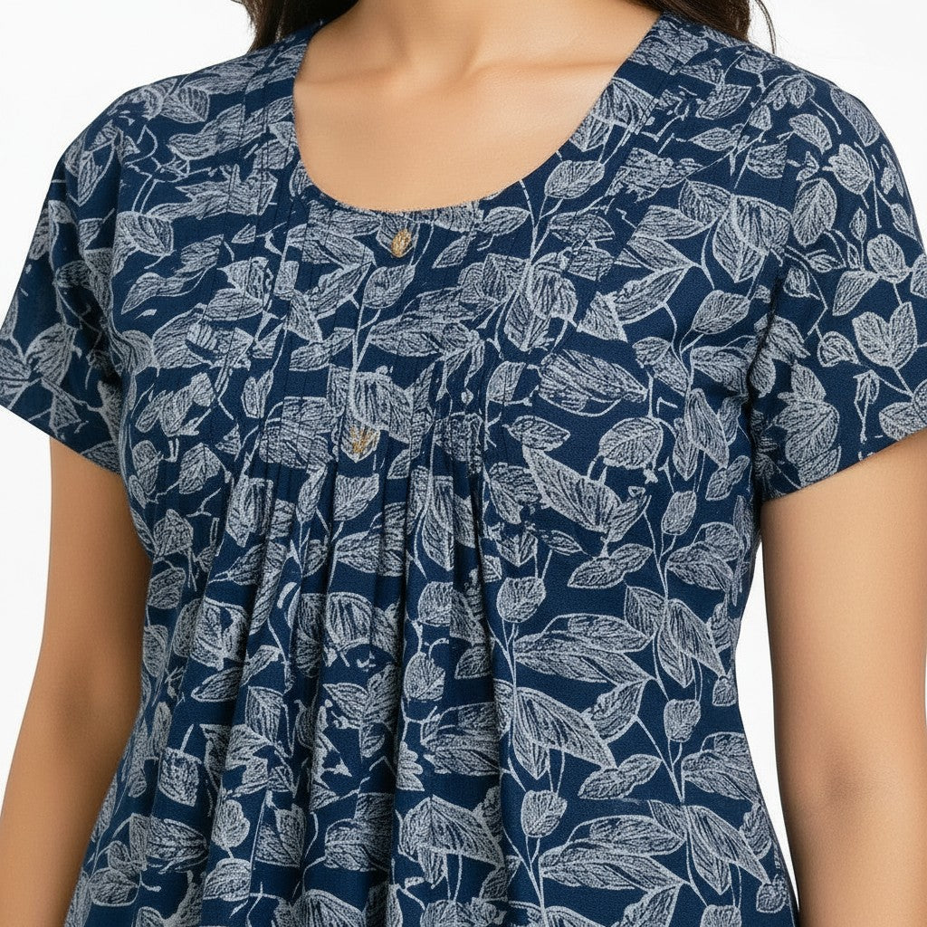ATHLEX SHOP navy blue midi loungewear dress with white leaf print, scoop neck, and button-front bodice pleats.