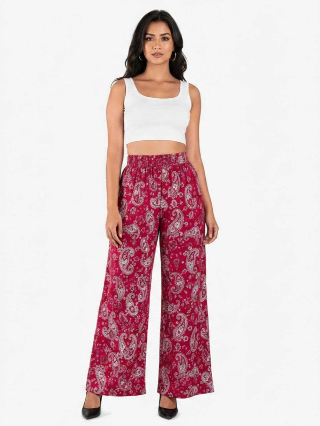 Model wearing ATHLEX SHOP pink paisley print wide-leg palazzo pants with an elastic waistband and white crop top.