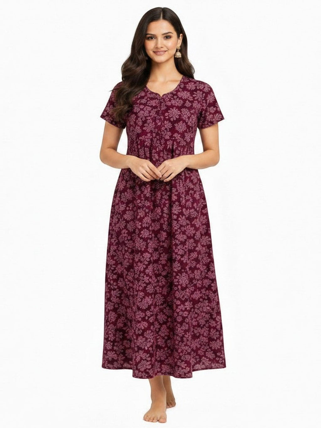 A woman wearing an ATHLEX SHOP wine-colored full-length nightdress with a floral leaf print, short sleeves, and V-neck.